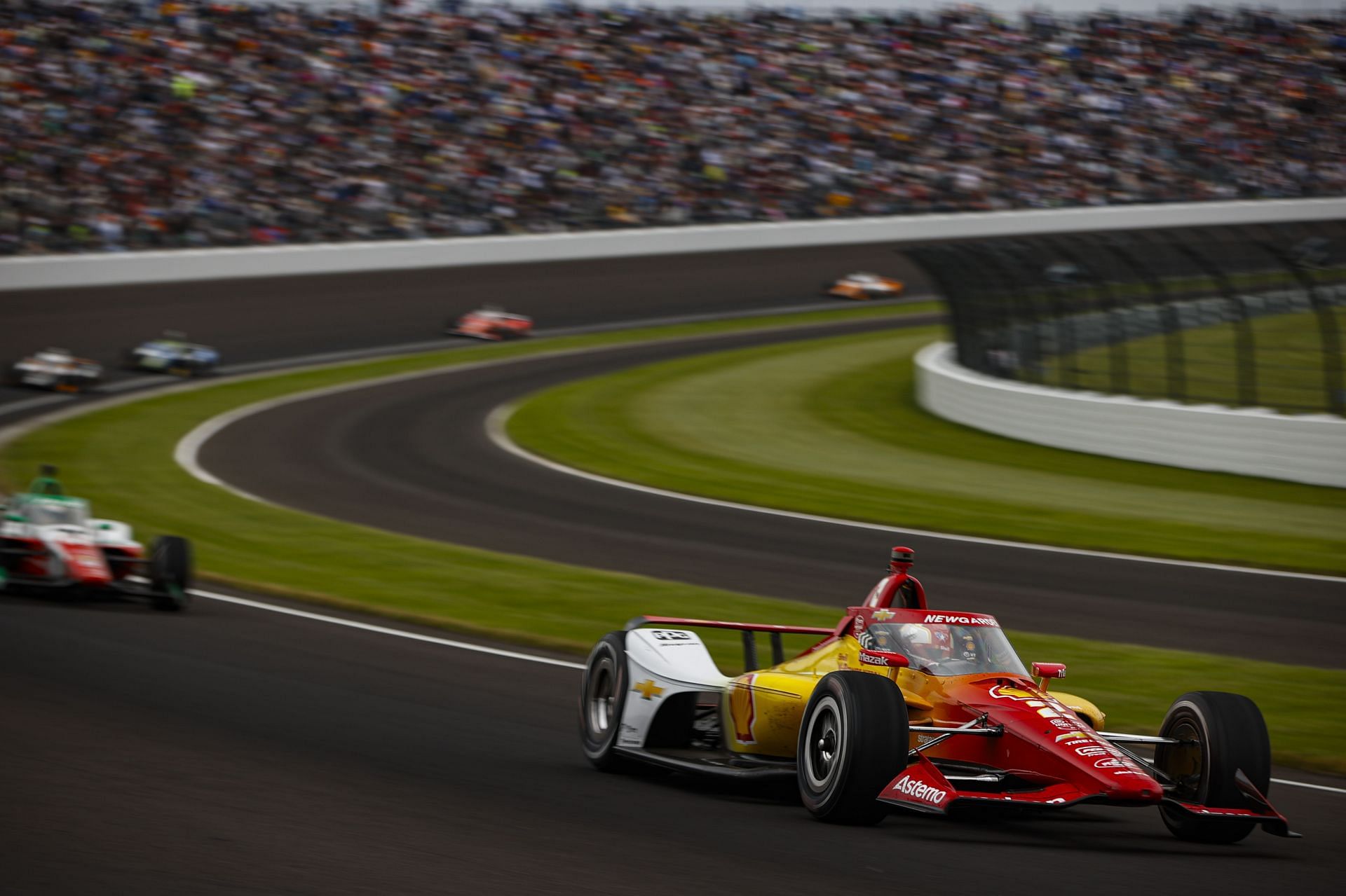 Josef Newgarden leads a bunch of cars at the 109th Running of the Indianapolis 500 - Source: Getty